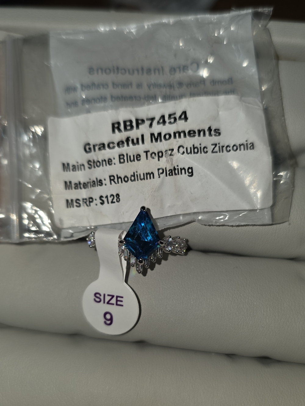Graceful Moments Rhodium-Plated Blue Topaz Cubic Zirconia Ring - Size 9